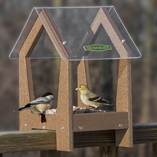 bird feeder attached to the deck railing