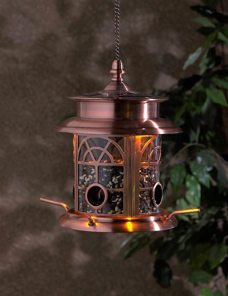 Decorative copper bird feeder with solar lights